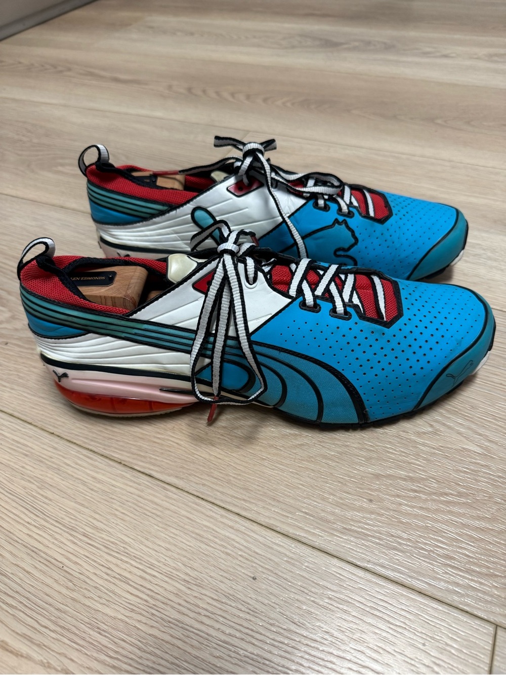 Puma Toori Run C, bold anime-inspired pop-art blue, white and red colorway 9.5